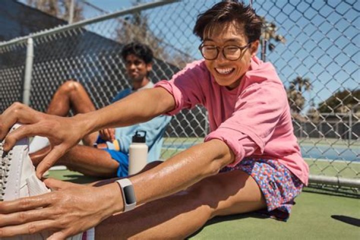 fitbit sense review eda sensor eda scan app 2 A user wearing a Fitbit Sense utilizes the devices EDA sensor.