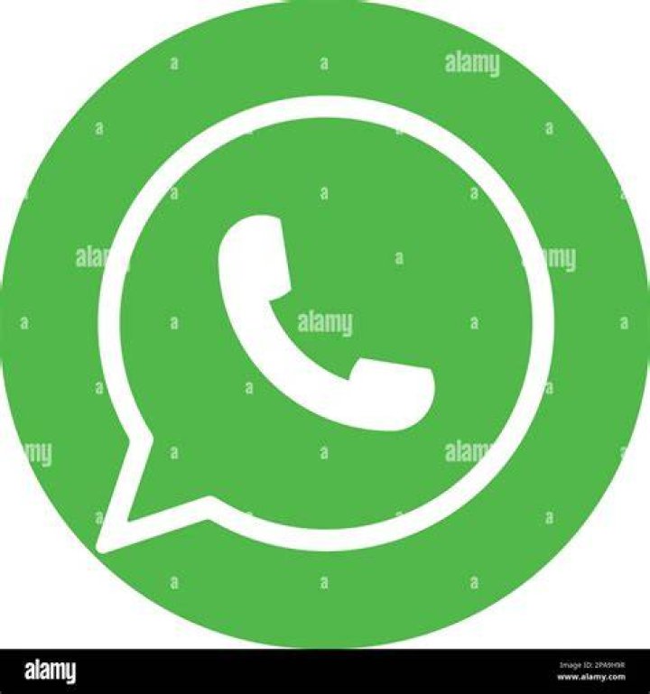 android-authority-whatsapp-hero-image-20 A WhatsApp app icon closeup on a smartphone.