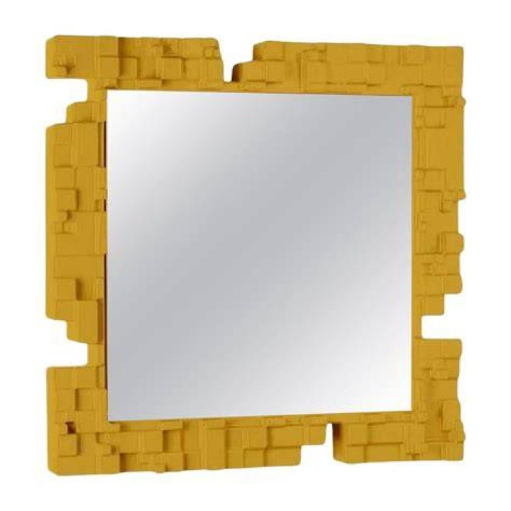 A yellow mirror compact holding four star-shaped stickers