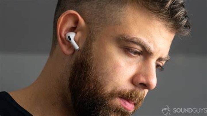 Apple AirPods Pro man wearing true wireless earbuds Apple AirPods Pro man wearing true wireless earbuds
