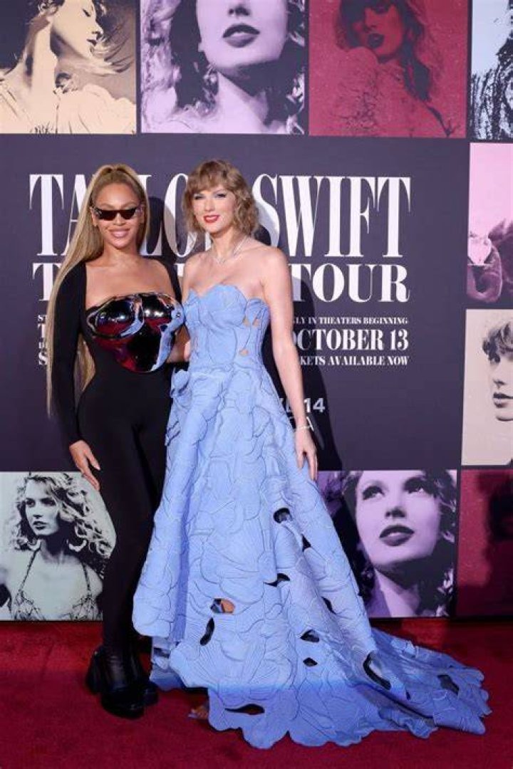 Beyonce and Taylor Swift pose at a screening of Taylor Swift the Eras tour Movie