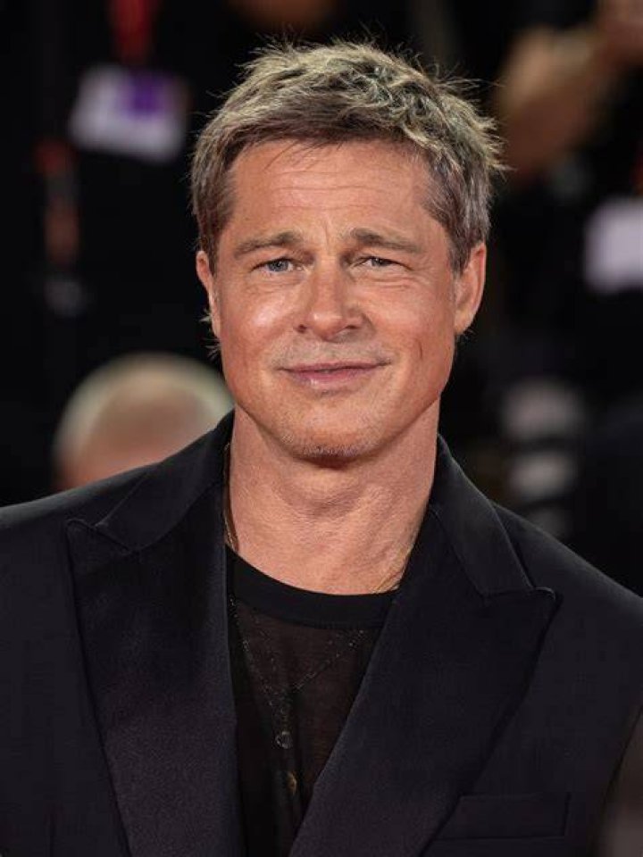Brad Pitt presents the Best Supporting Actress Award at the 2021 Oscars.