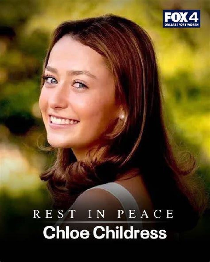Chloe Cherry making a peace sign with yellow star stickers on her face