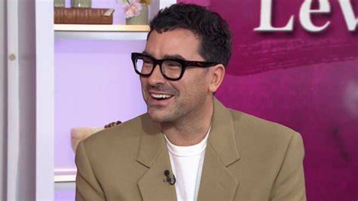 Dan Levy finally taking the sweaters off.