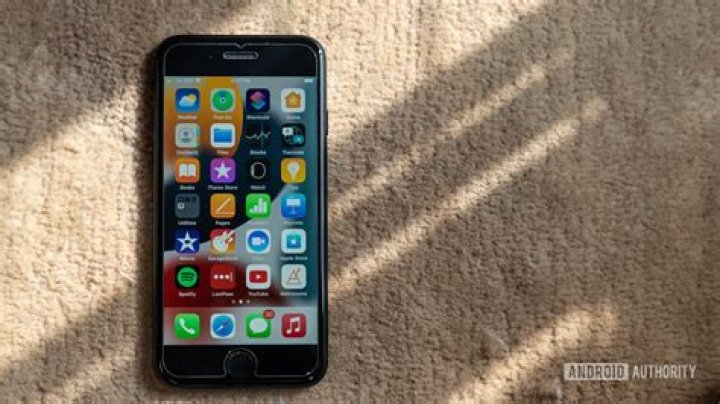 iPhone SE 2022 review second opinion showing back of the phone in hand iPhone SE 2022 review second opinion showing back of the phone in hand