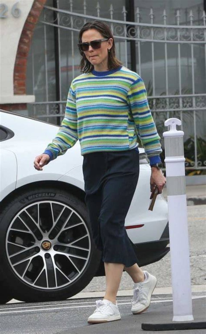 Jennifer Garner in a striped shirt and face mask