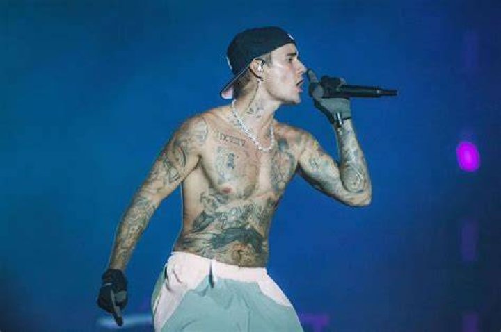 Justin Bieber on stage walking