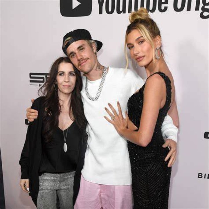 Justin Bieber with three star stickers on his face