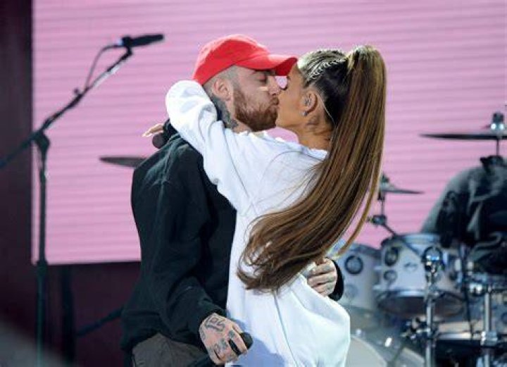 mac miller and ariana grande at a football game