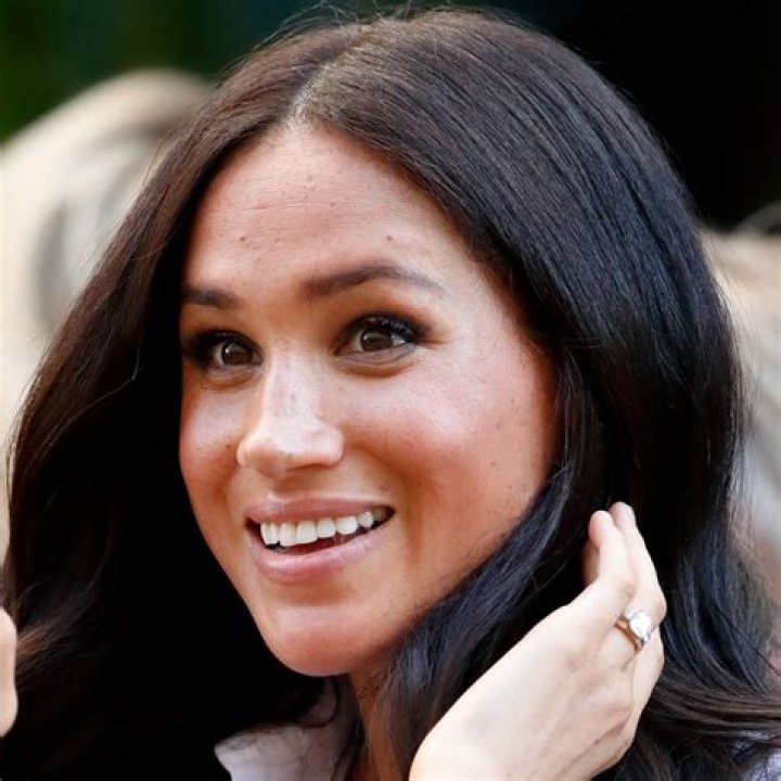 Meghan Markle Wore a Nude OneShouldered Gown With a Trio of Leg Slits on the Red Carpet
