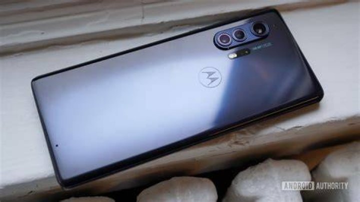 Motorola Edge Plus on window sill Motorola Edge Plus on window sill