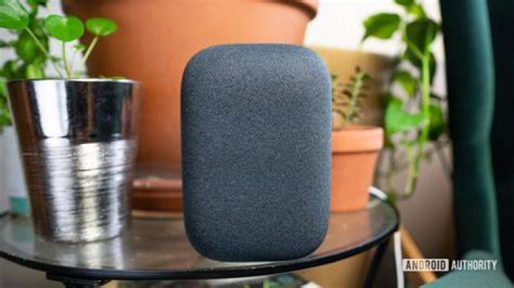 Google Nest Audio minimal design Nest Audio pictured on glass table with plants