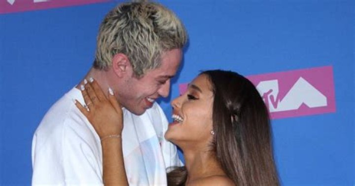 Pete Davidson embracing Ariana Grande at awards show