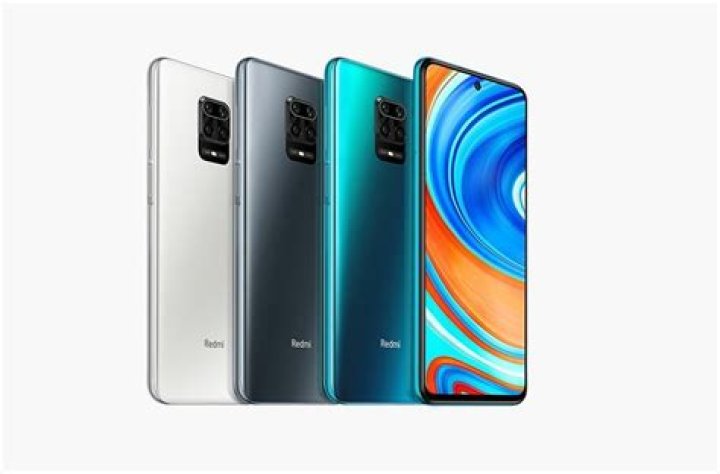 Redmi Note 9 Pro in hand with camera Redmi Note 9 Pro in hand with camera