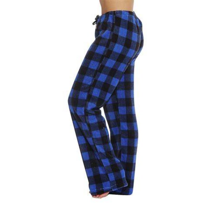 Rihanna modeling blue plaid pjs with a butt cutout