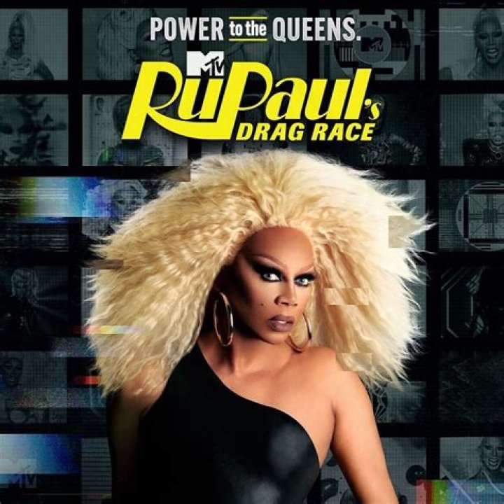 Ru Paul wearing a metallic shimmery gown