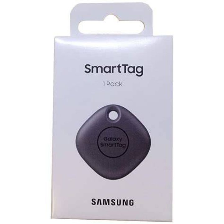 Samsung Galaxy SmartTag on table next to phone 31 Samsung Galaxy SmartTag Bluetooth tracker